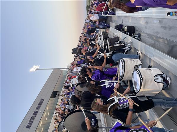 Little Rattler Night: Middle School students in football stands.